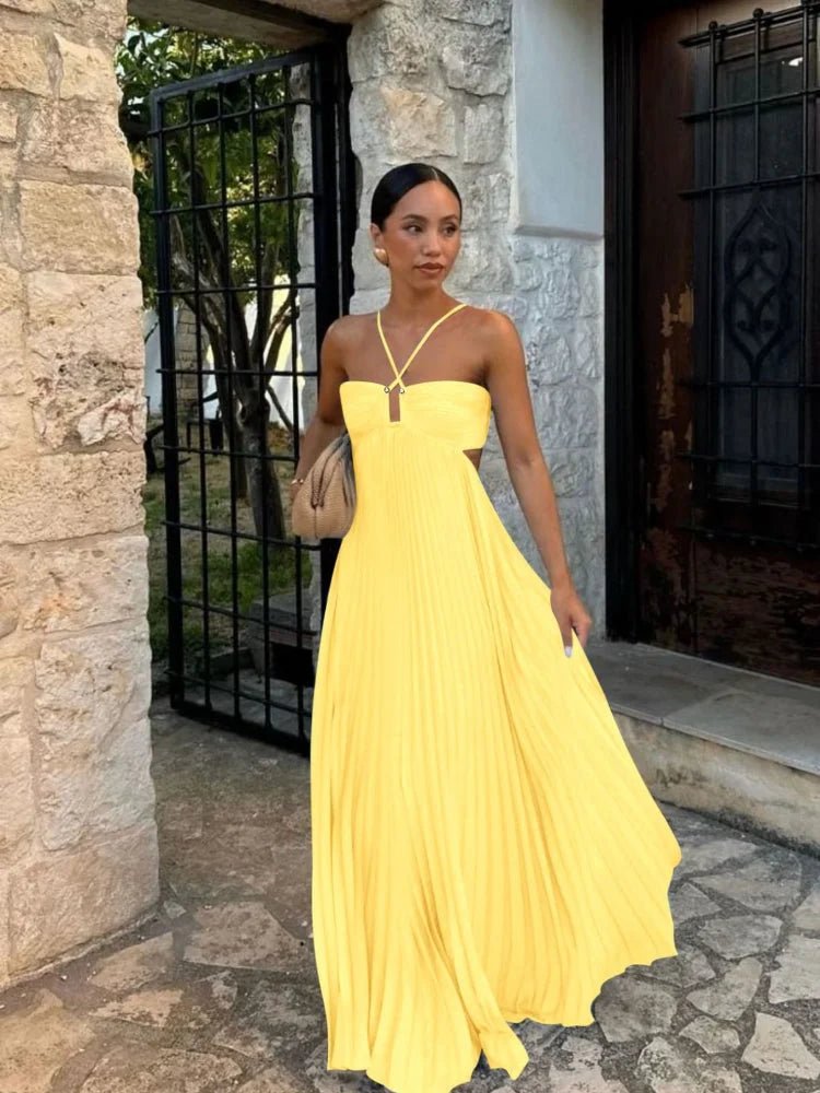 Halter maxi dress with hollow out details for summer.